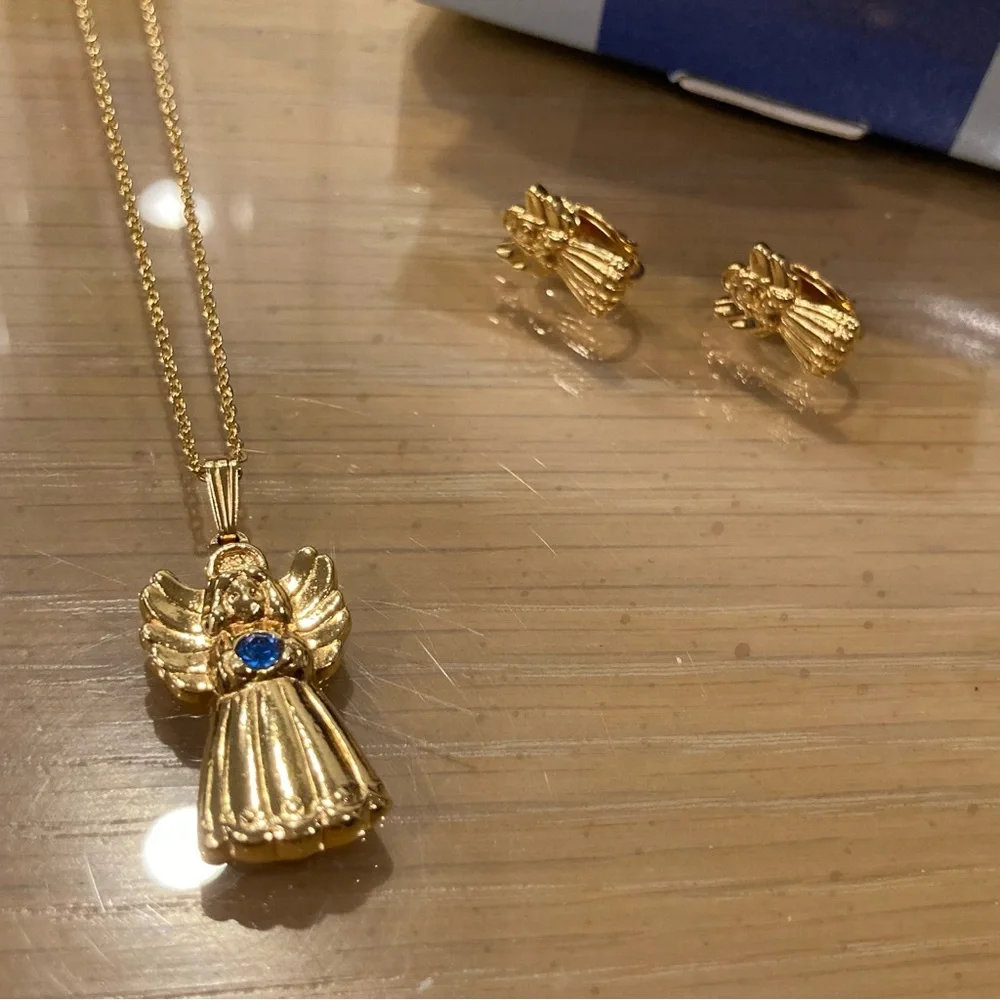 Vintage 90’s Avon Golden Heavenly Angel Pendant/Clip on Earrings. Blue Stone
